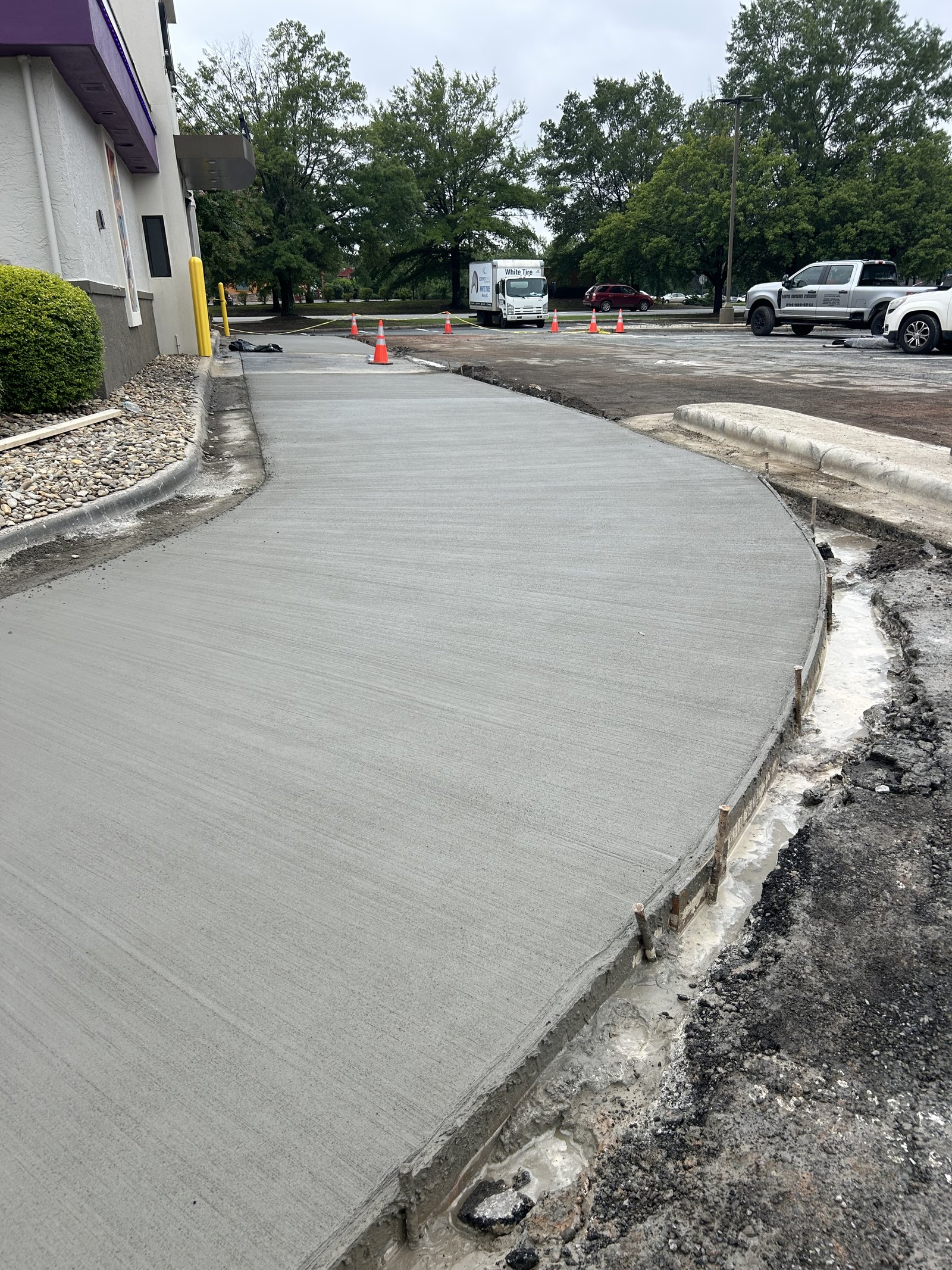 Freshly poured broom finish concrete sidewalk in Spartanburg SC