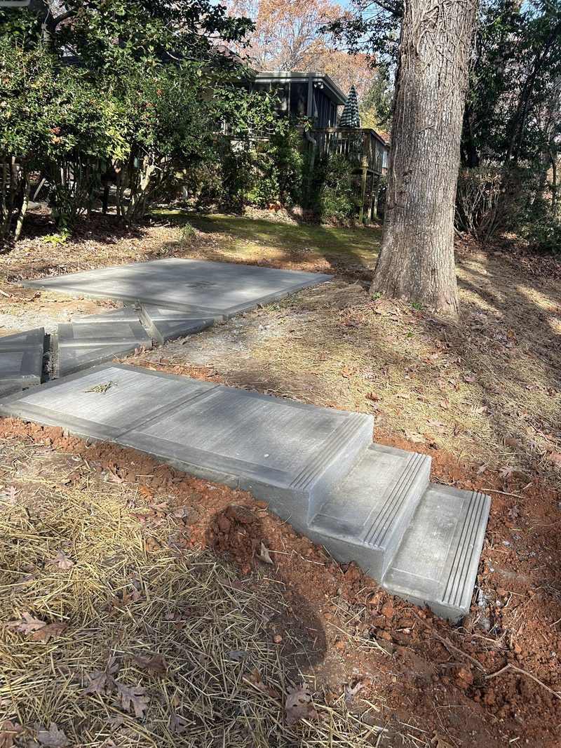 New concrete steps and pad in residential backyard in Spartanburg SC